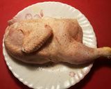 Foto del paso 1 de la receta Pollo al horno, con ajos, perejil y patatas