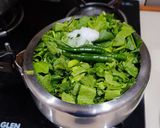 A picture of step 3 of Sarso Ka Saag (sarso, palak, bathua).