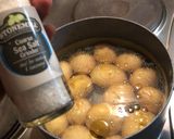 A picture of step 3 of Light Chilli Salmon With Baby Potatoes.