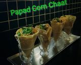A picture of step 3 of Papad Corn Chaat.