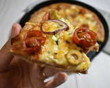Foto del paso 9 de la receta: Pizza integral en panificadora con verduritas y queso