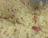 A picture of step 2 of Onion Cumin Rice.