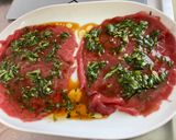 A picture of step 8 of Beef Carpaccio with Cilantro and Parmesan.