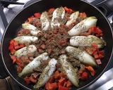 Une image de l'étape 10 de Flan d'endives caramélisées aux tomates, poivron, jambon cru et fromage frais.