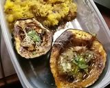 A picture of step 5 of Sweet & Fruity Blueberry-Plum Baked Acorn Squash.