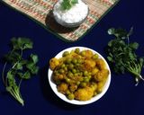 A picture of step 6 of Gobhi Matar Curry.