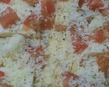 Foto del paso 6 de la receta: Pizza 2 sabores: huevo duro, olivas negras y 4 quesos con olivas verdes