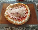 Foto del paso 3 de la receta: Pizza margarita con jamón cocido y queso