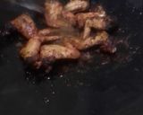 A picture of step 4 of Chickens wings and fried chips.