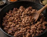 A picture of step 4 of Crispy-Edged Ground Beef Tacos with Quick Lime Onions.