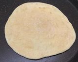 A picture of step 6 of Jain Cheese burst pizza.