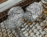 A picture of step 2 of Potatoes in the embers.