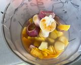 Une image de l'étape 12 de Poulet aux cacahuètes, carottes, tomates et épices.
