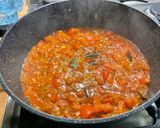 A picture of step 10 of Eggplant Curry with Mushrooms, Tomatoes, and Coconut Milk.