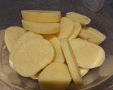 A picture of step 2 of Buttery Potatoes And Red Peppers.