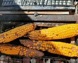 Une image de l'étape 1 de Épis de maïs grillés à la braise 🌽.
