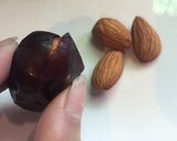 A picture of step 2 of Chocolate Stuffed Assorted Dates.