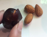 A picture of step 2 of Chocolate Stuffed Assorted Dates.