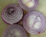 A picture of step 1 of Crispy Baked Onion Rings.