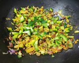 A picture of step 3 of Bread Upma.