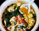 A picture of step 3 of Banh Canh with Mushrooms, Tofu, and Seaweed.
