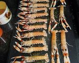 Foto del paso 5 de la receta Almejas con vino blanco ajo, perejil y unas cigalas a la plancha