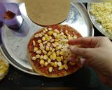 A picture of step 3 of Whole wheat thin crust cheese corn pizza.