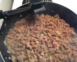 A picture of step 9 of Burrito Stuffed Spaghetti Squash.