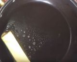 A picture of step 1 of Camarones a la Diabla.