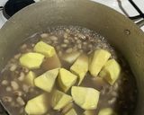A picture of step 2 of Beans / sweet potato porridge.