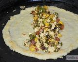 A picture of step 12 of Moong dal (lentil) and chickpea roll (chila).