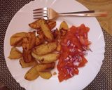 A picture of step 4 of Baked potatoes with kachumbari.