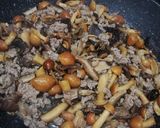 A picture of step 2 of Tagliatelle with Mushrooms, Sausage, and Cream.