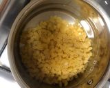 A picture of step 1 of Macaroni cheesy spicy saucy.