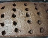 A picture of step 5 of Chocolate pudding poke cake.