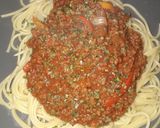 A picture of step 10 of Spaghetti Bolognese.