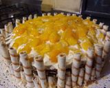 Foto del paso 6 de la receta: Torta de chocolate con crema y duraznos