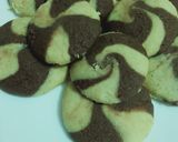A picture of step 9 of Two tone cookies with chocolate filled inside.