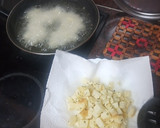 Foto del paso 7 de la receta: Habichuelas compuestas con carne de cochino, papas fritas y huevo duro