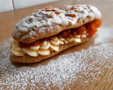 Foto del paso 6 de la receta Eclairs sin gluten de crema y albaricoque con chocolate blanco