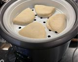 A picture of step 11 of Steamed Chicken Bao Buns:.