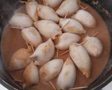 Foto del paso 13 de la receta: Coca de vidre de calamarcitos rellenos de pollo asado y cebolla caramelizada