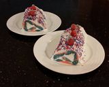 A picture of step 28 of Patriotic Vanilla Cake Roll with Whipped White Chocolate Ganache Filling and Frosting.