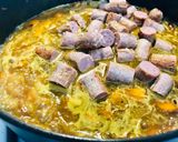 A picture of step 4 of Curried sausages.