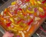 A picture of step 4 of One Pan Spicy Chicken, Veggie and Rice Bake.