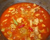 A picture of step 5 of Jhinge Chicken Posto (Chicken with Ridge gourd and poppy seeds).