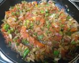 A picture of step 3 of Fish masala with onion tomato tasty tasty.