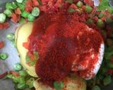 A picture of step 2 of Rava veg Mayonaisse sandwich.