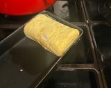 A picture of step 5 of Japanese seaweed tamagoyaki - rolled omelette.