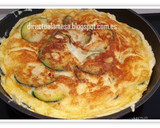 Foto del paso 3 de la receta: Tortilla de calabacín y queso azul